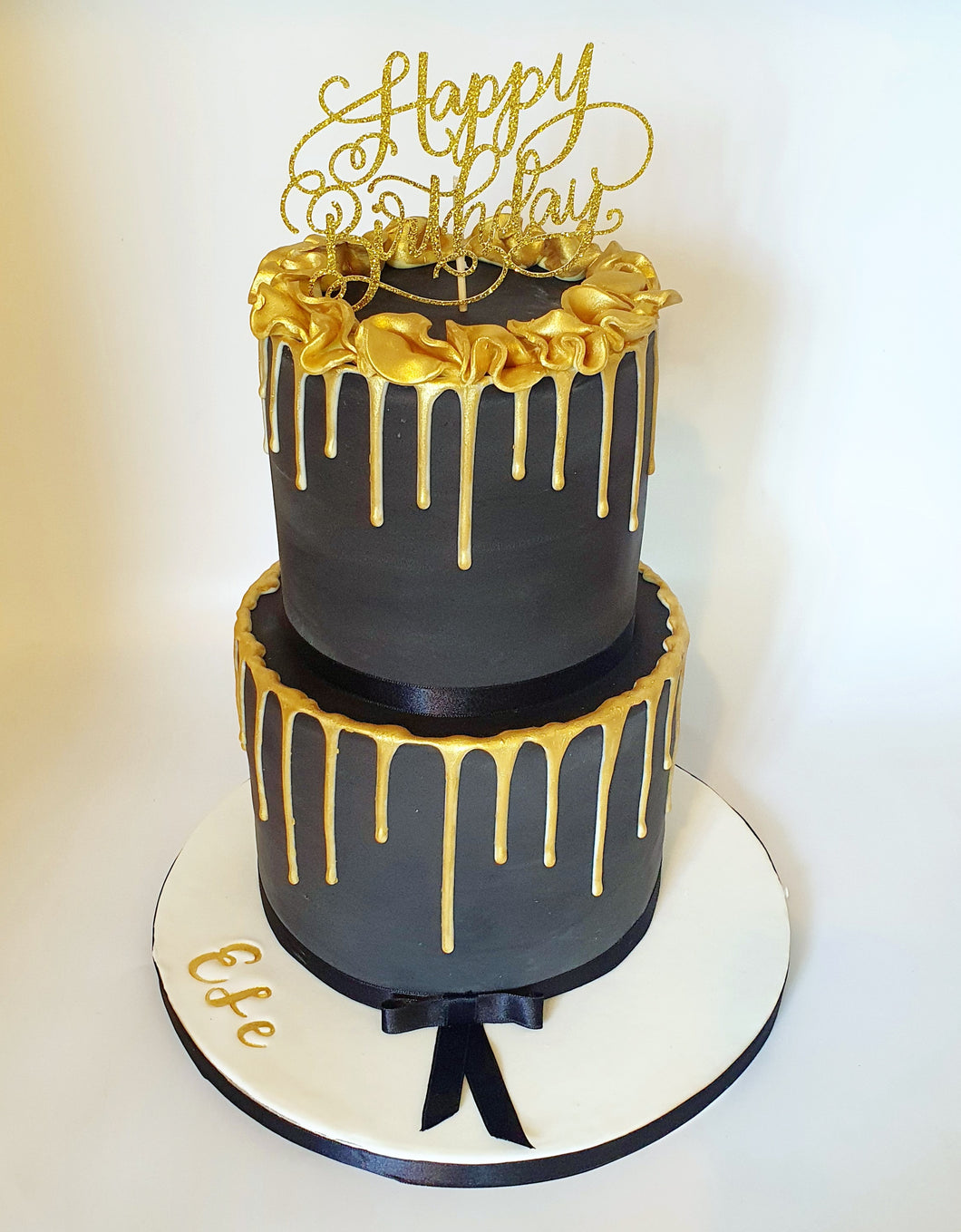 Black and golden cake