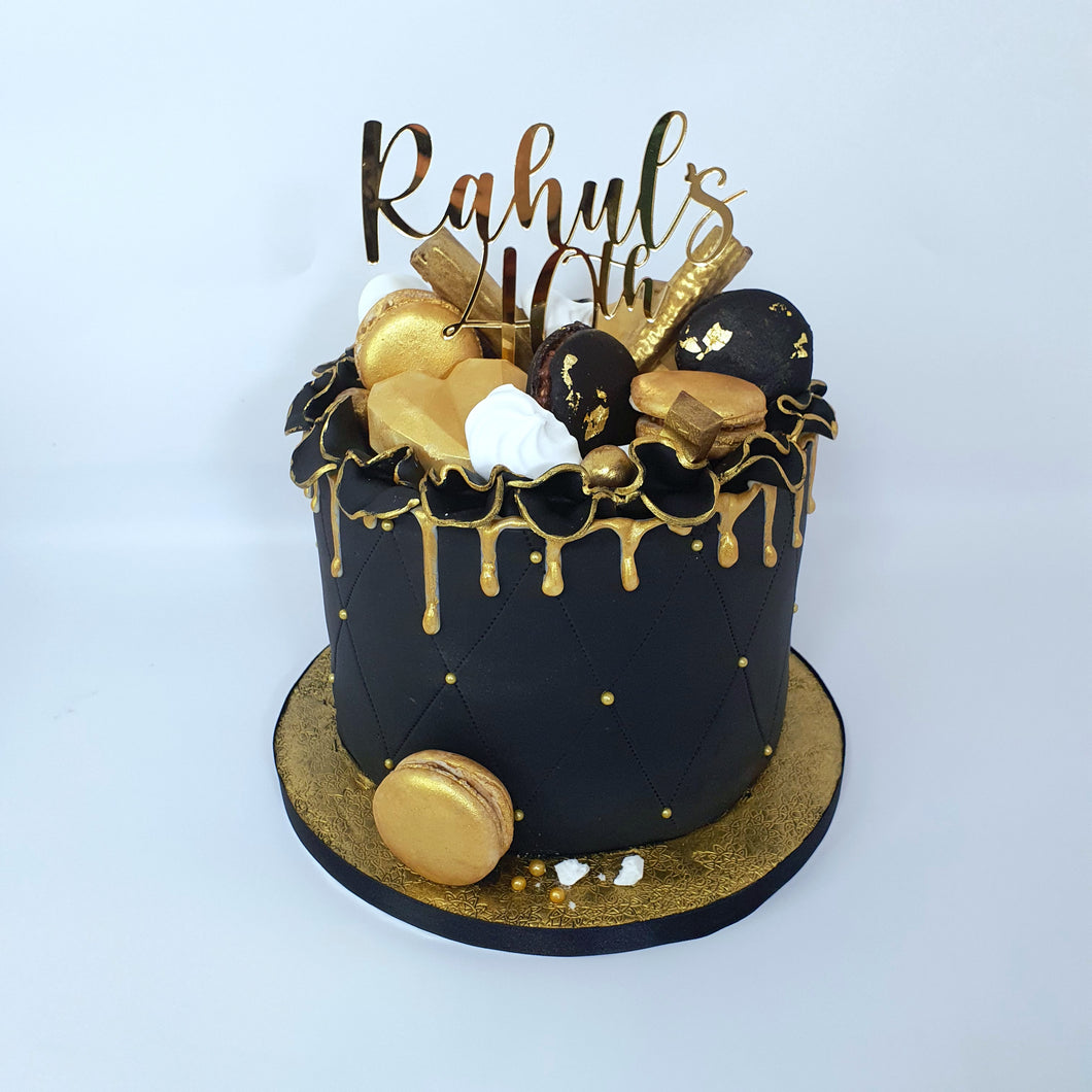 Black and gold birthday cake